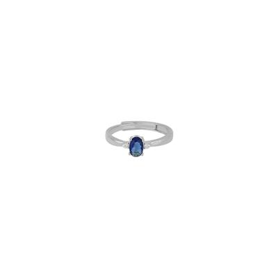 ANELLO RODIO OVALE BLU CON DUE ZIRCONI LATI IN ARGENTO 925°/°°